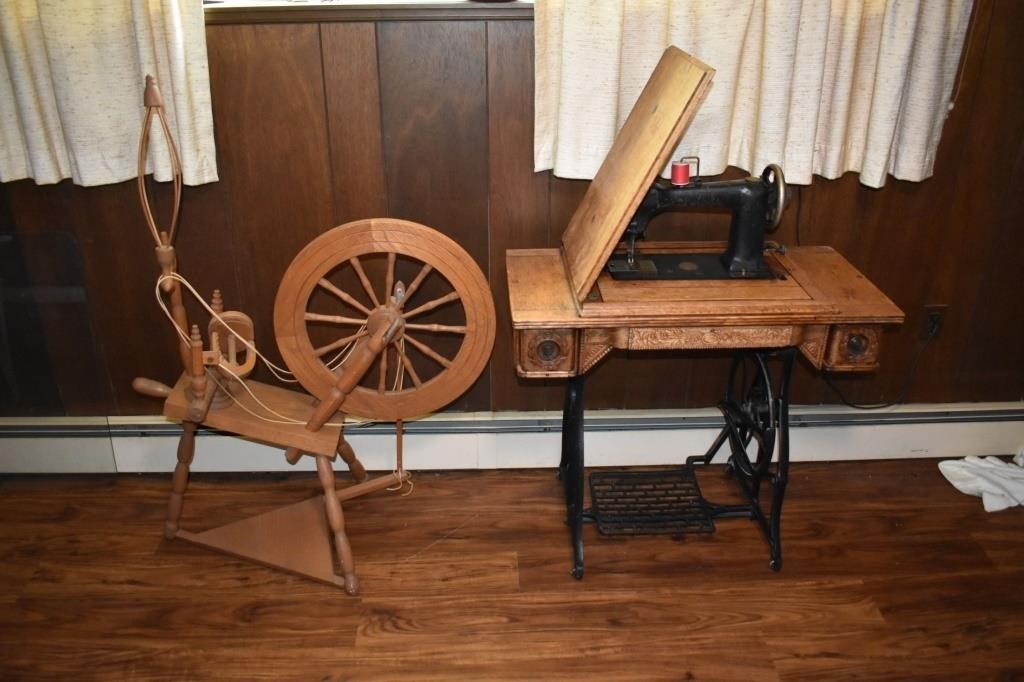 Treadle sewing machine and oak cabinet along with