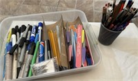 Markers, pens, pencils, nail files, plastic box w/