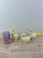 Three porcelain geese figures