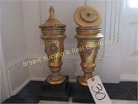 PAIR BLACK & GOLD COLORED COVERED URNS