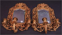 A pair of brass three-candle Bacchus wall sconces