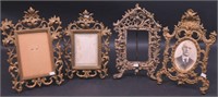 Four intricate metal picture frames