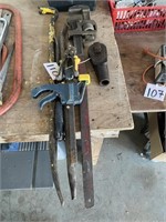 large pipe wrench and bars