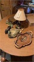Contents of table, wild life decor and lamp