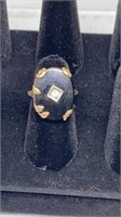 Black stone gold ring stamped 14k sz 5.5