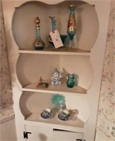 Items on three Shelves.