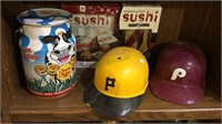 Sushi kit, two softball helmets, cow tin with