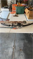 Older Jennings compound bow with arrows Right