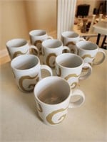 Set of 8 Oscar de la Renta designer coffee mugs. D