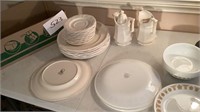 5 Corelle plates, 4 serving plates, five bowls,