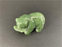 Alaskan Kobuk jade carved large bear who has caugh