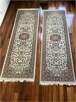pair of matching rugs