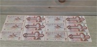 Lot of 12 Mint Two Dollar CDN Bills from 1986