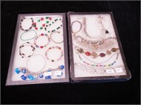 Two trays of costume jewelry including
