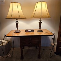 Table with lamps and clock