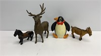 (3) cast iron animal coin banks and penguin coin
