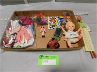 Barbie doll, other dolls, some doll clothes and to