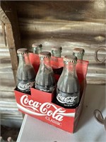 6 pack of vintage glass coke bottles