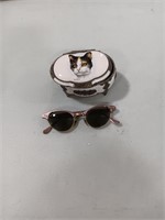 Retro sunglasses, musical box, broken lid