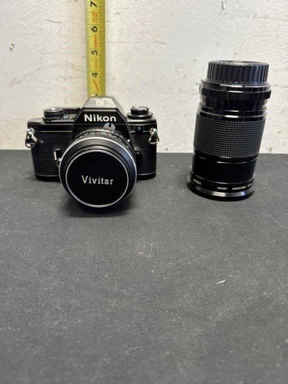 Nikon35mm em film camera with 2 lenses