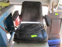Tractor seat, tarp straps