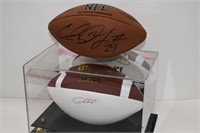 Two Autographed Footballs