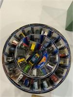large tin of hot wheels in packages