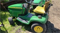 John Deere GT235 tractor with 4 wheel steer-as is