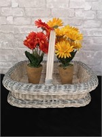 Home decor, wicker handled basket and flowers