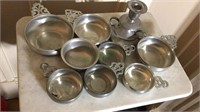 Collection of 7 pewter porringers, and a pewter