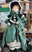 LARGE PORCELAIN DOLL AND STAND