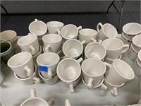 About 30 Mugs