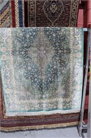 Fine Persian Qum green silk rug