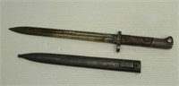 Bayonet with 11.5" blade and sheath.