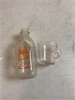 AE milk bottle and Pyrex measuring cup