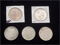 1924 1925 1926 S 1934 D Silver Peace Dollars.