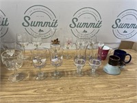 Variety of wine glasses and coffee cups