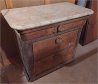 (R) Antique three drawer chest with carved pulls,