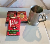 Tobacco tins and cup