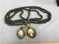3 Stranded jade bead necklace with religious icon