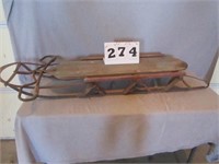 Vintage iron and wood slatted sled