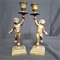 Pair of vintage brass figural candlesticks