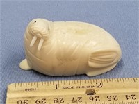 2 1/2" x 1 1/2" fossilized ivory carving of a walr
