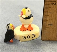 2 ivory puffin carvings, smaller one is 1 1/4" tal