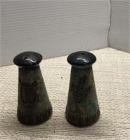 black with colored art shakers