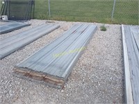 pile of 10'x32" roofing tin