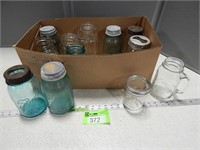 Assorted canning jars; some may be antique