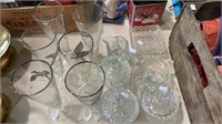 Collection of vintage clear glass, covered jars,