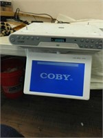 Coby DVD player that hangs from the ceiling and