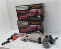 Nintendo items including (2) empty boxes, game